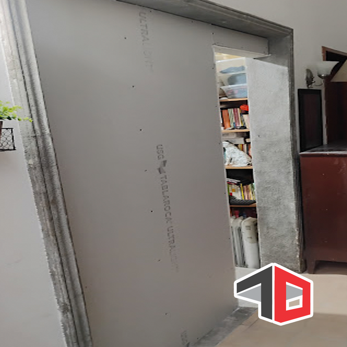 Instalación de placas de Tablaroca en muro